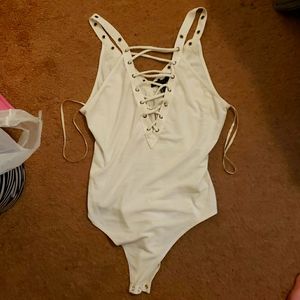 White lace up body suit